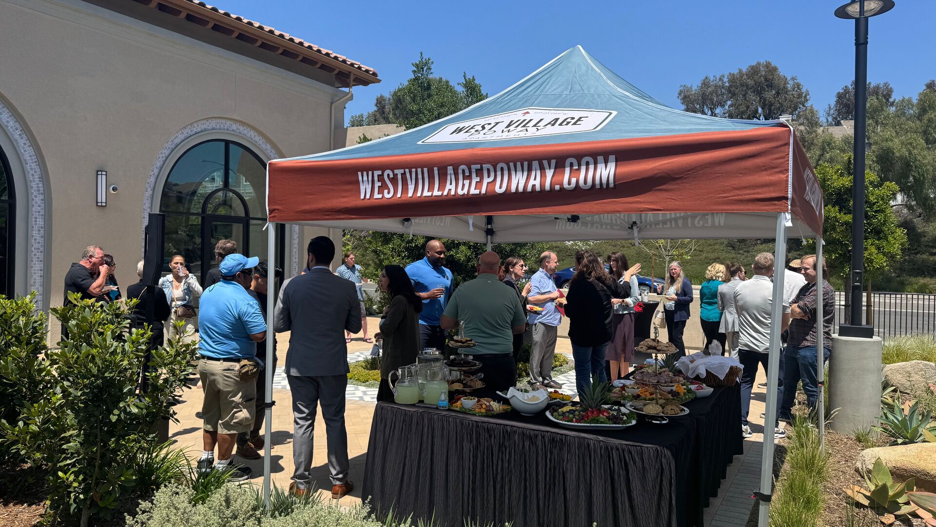 Branded tent and food at West Village Poway.