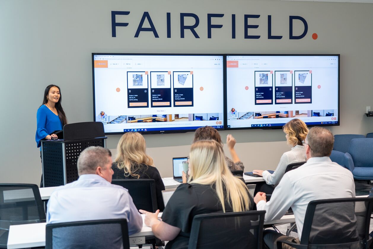 A Fairfield associate presents in a meeting